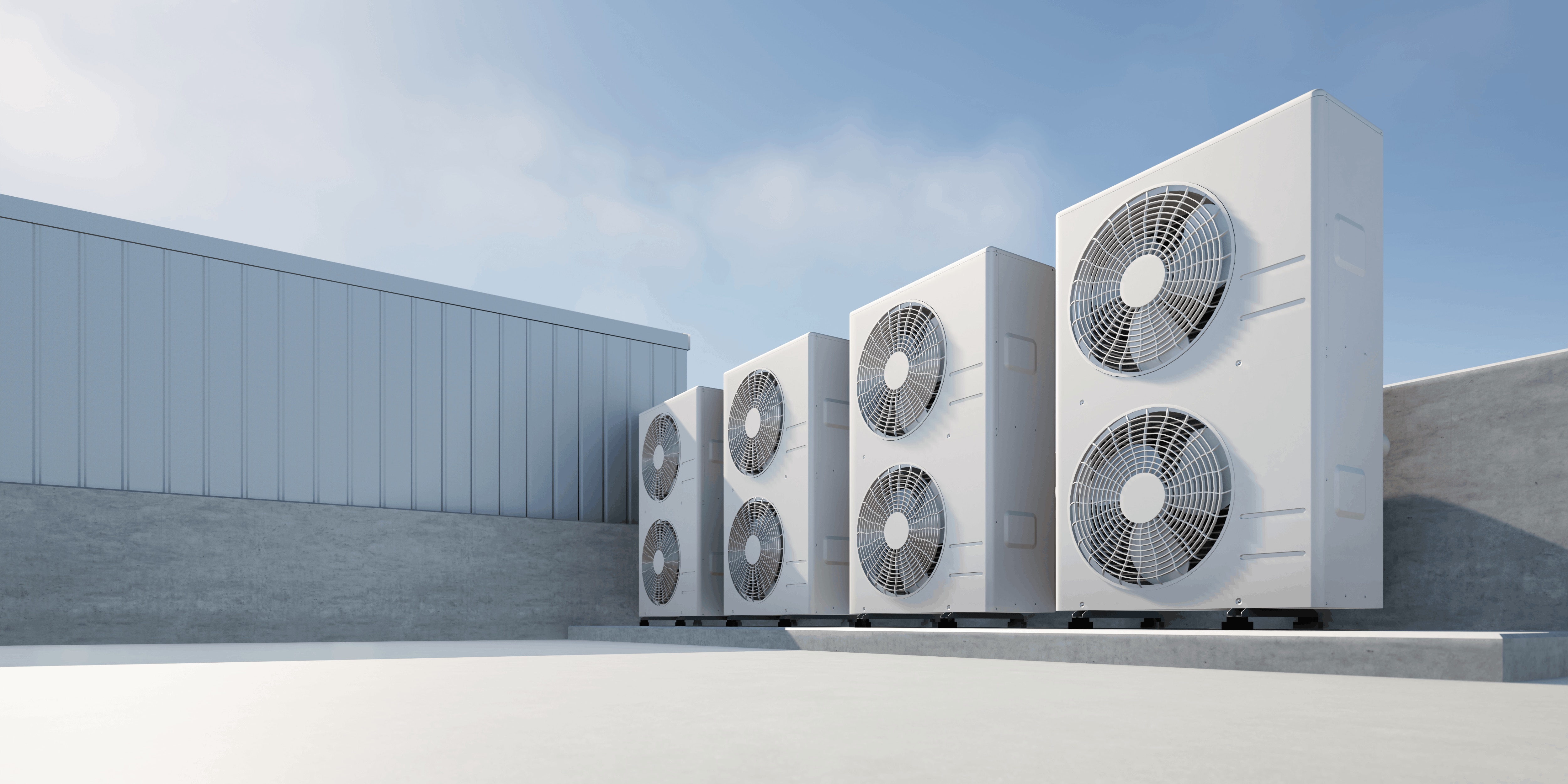 Row of A2L refrigeration condensing units outside a cold storage facility